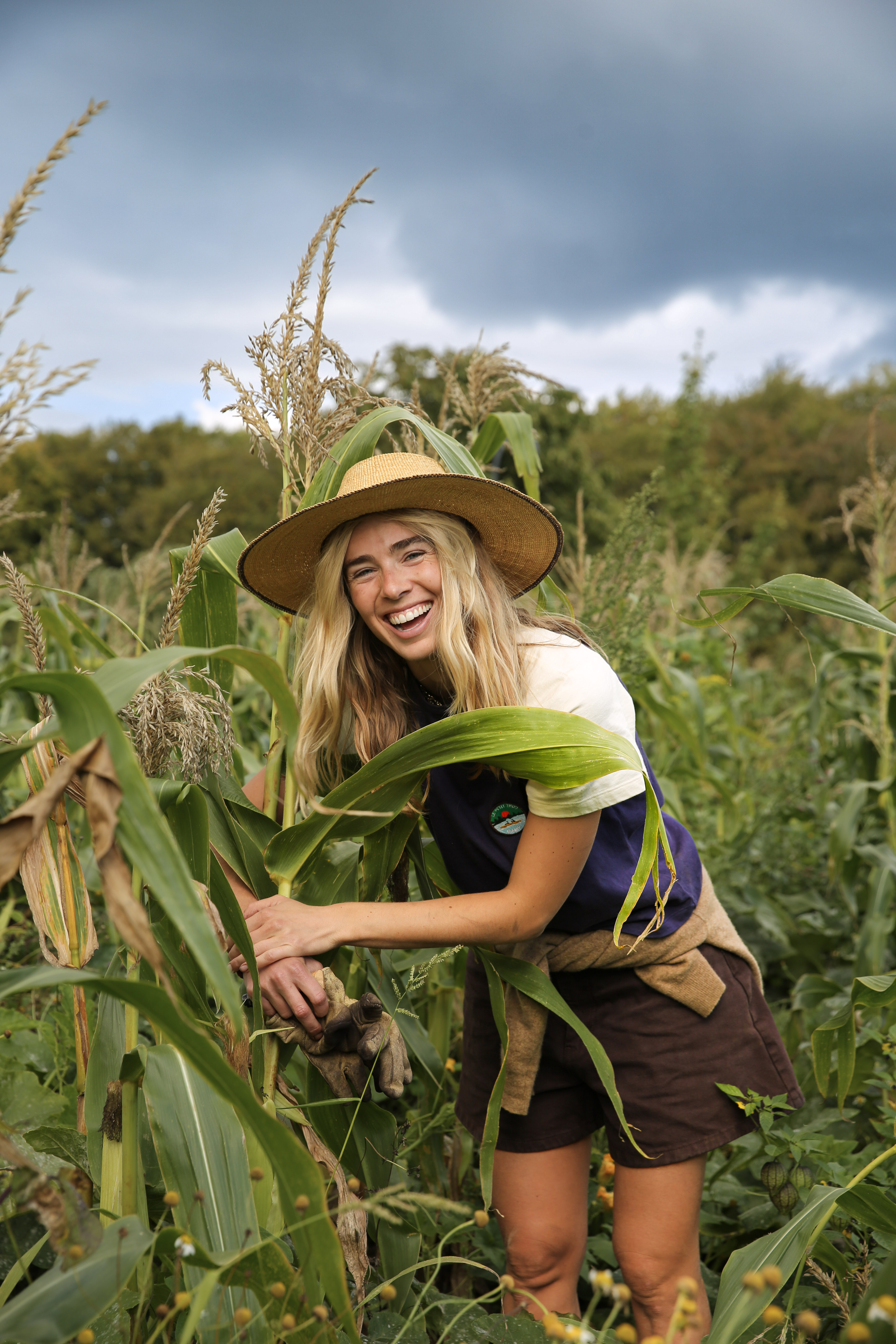 Mathilde in a field wearing a hat
